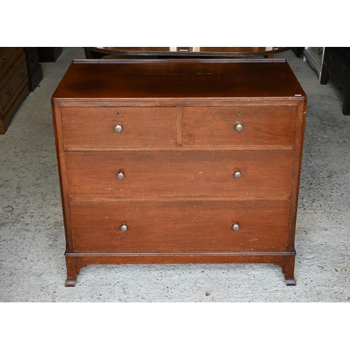 467 - A bright satinwood chest of two short over two long graduated drawers on splayed bracket feet, 1950s... 