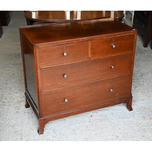 467 - A bright satinwood chest of two short over two long graduated drawers on splayed bracket feet, 1950s... 