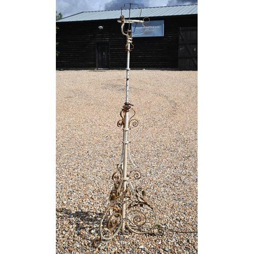 468 - # An antique rise and fall wrought iron oil lamp stand (converted to electricity)