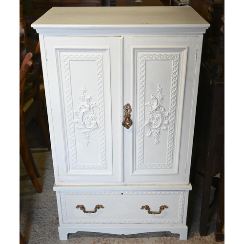 471 - An old white painted twin door cabinet over base drawer on shaped bracket feet, 71 x 47 x 115 cm h