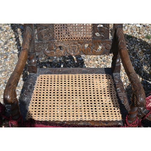 475 - # An antique carved walnut cane panelled carver to/w a pair of similar side chairs in the Carolean s... 