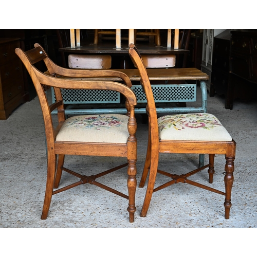 477 - A set of four Regency mahogany side chairs with needlepoint upholstered pads, floral design to/w a m... 