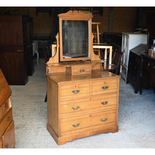 487 - An Edwardian mirror backed ash dressing chest with two short over two long graduated drawers on a pl... 