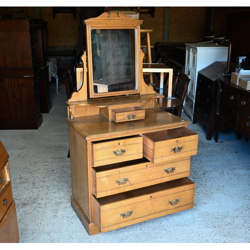 487 - An Edwardian mirror backed ash dressing chest with two short over two long graduated drawers on a pl... 