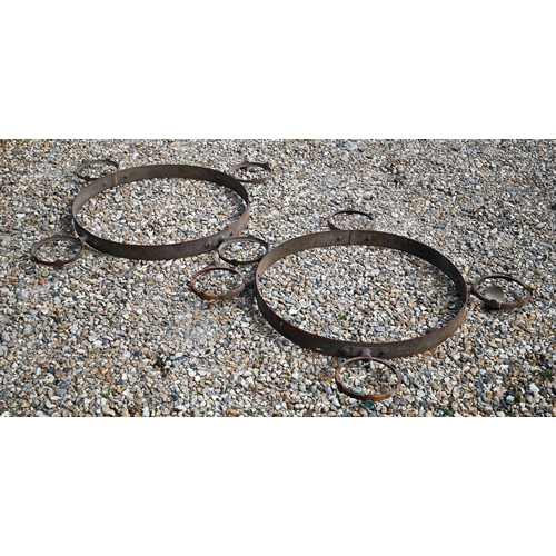 496 - A pair of weathered circular steel hanging lantern frames for restoration, 112 cm dia. o/a (2)