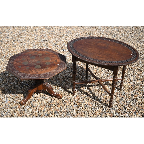 502 - An antique carved and brass inlaid Indian low table on tripod base, 61 x 59 x 43 cm h to/w another w... 