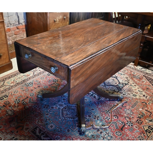 508 - # A Victorian cross-banded mahogany drop leaf table with frieze drawer to one end, raised on a swept... 