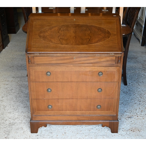 522 - # A 1970's mahogany bureau with four drawers, raised on shaped bracket feet, 76 cm x 38 cm x 100 cm ... 