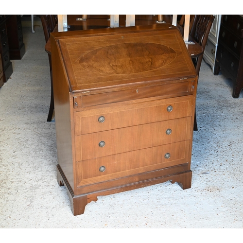 522 - # A 1970's mahogany bureau with four drawers, raised on shaped bracket feet, 76 cm x 38 cm x 100 cm ... 