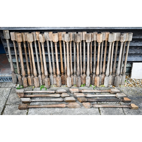 529 - A quantity of old turned oak staircase spindles  - approx. 43, each 80 cm long