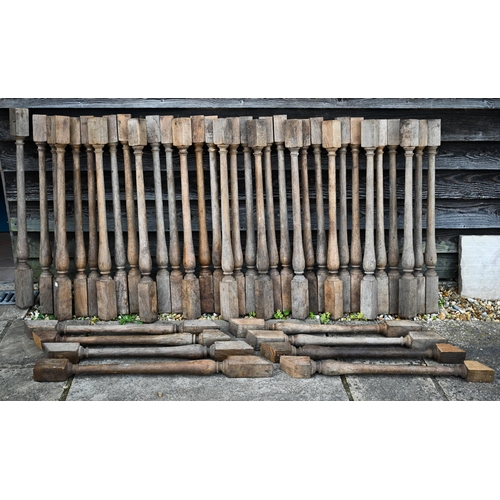 529 - A quantity of old turned oak staircase spindles  - approx. 43, each 80 cm long