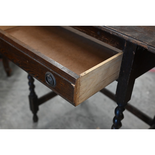 530 - # An oak drop-leaf side table on barley twist supports 65 x 45 x 75 cm h to/w a vintage painted cot ... 