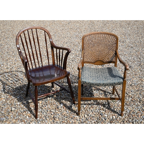 532 - A spindle back elbow chair to/w another elbow chair with caned back (2)