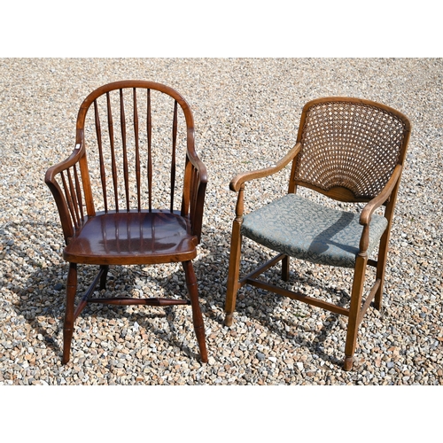 532 - A spindle back elbow chair to/w another elbow chair with caned back (2)