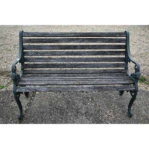 6 - A weathered wood slat Victorian style garden bench with alloy frame, 126 cm w