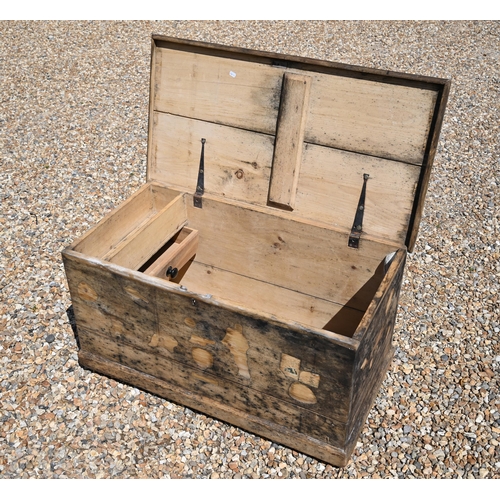 75 - An old weathered and stained pine trunk, the interior with side drawer, 105 cm x 56 cm x 56 cm h