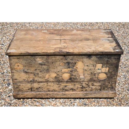 75 - An old weathered and stained pine trunk, the interior with side drawer, 105 cm x 56 cm x 56 cm h