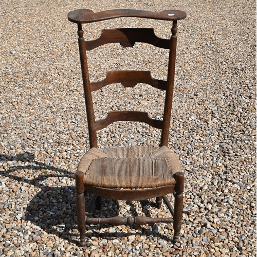 85 - # A country fruitwood rope seat pre dieu chair to/w another nursing chair (2)