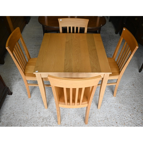 90 - A Lacock oak extending dining table, 80 x 80 x 75 cm (112 cm max) to/w a set of four Lyon oak dining... 