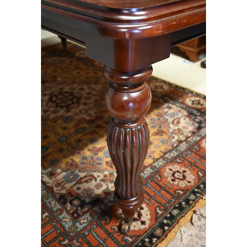 92 - A Regency style mahogany extending dining table with single wide leaf raised on bobbin reeded turned... 