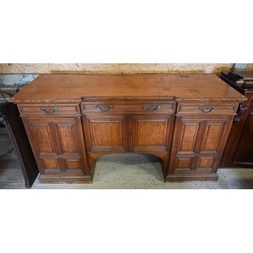 97 - Howard & Sons, Berners St, London, a late 19th century golden oak inverted breakfront sideboard ... 