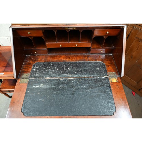 334 - A Georgian mahogany fall front bureau with five drawers and associated glazed bookcase top 80 cm w x... 