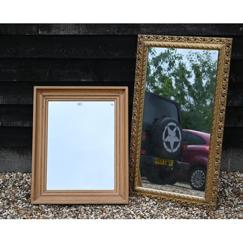 480 - A rectangular wall mirror in carved and moulded pine frame 60 cm x 75 cm to/w another rectangular mi... 