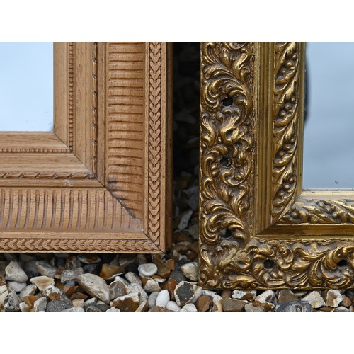 480 - A rectangular wall mirror in carved and moulded pine frame 60 cm x 75 cm to/w another rectangular mi... 