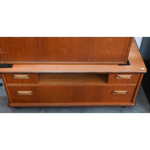 333 - A mid-century teak nest of three tables, largest 52 x 40 x 48 cm h to/w low media cabinet (2)