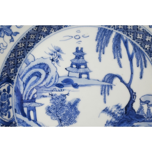 439 - Three 18th century Chinese blue and white export plates, the two circular examples painted in underg... 