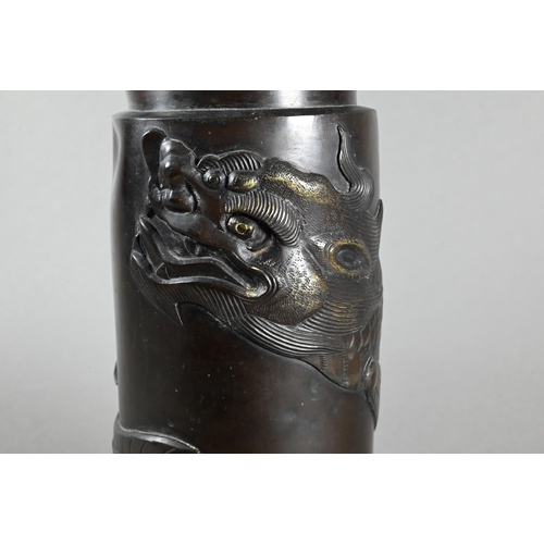 448 - An early 20th century Chinese bronzed metal vessel with high relief mythical sea beast encircling th... 