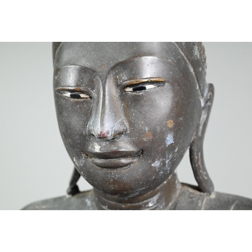 472 - A large 19th century Burmese Mandalay style bronze Shakyamuni Buddha, seated in the lotus position o... 