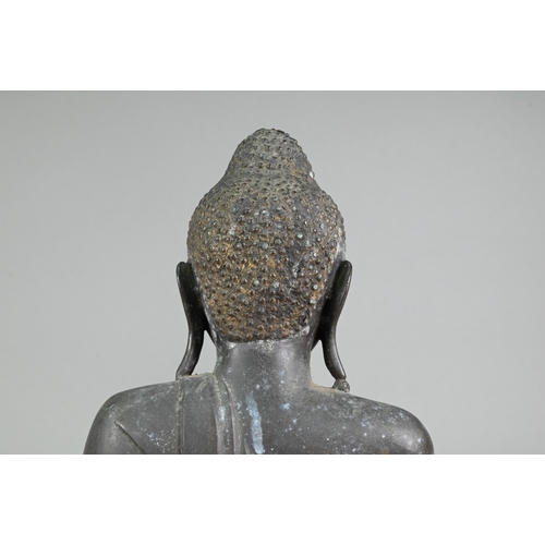 472 - A large 19th century Burmese Mandalay style bronze Shakyamuni Buddha, seated in the lotus position o... 