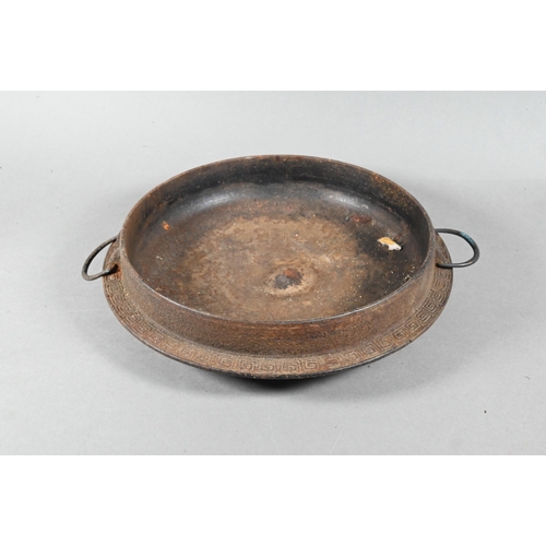 473 - An 18th/19th century Japanese cast iron tripod censer or incense burner of shallow circular form wit... 