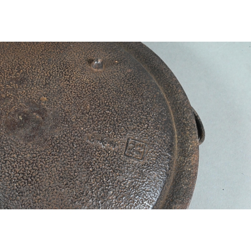 473 - An 18th/19th century Japanese cast iron tripod censer or incense burner of shallow circular form wit... 