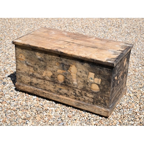 46 - An old weathered and stained pine trunk, the interior with side drawer, 105 cm x 56 cm x 56 cm h