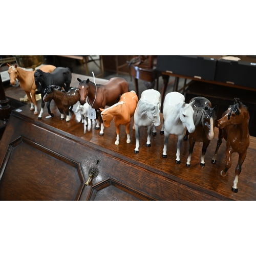 100 - Nine various Beswick china ponies, to/w a small foal and a Beneagles Whisky eagle (11)