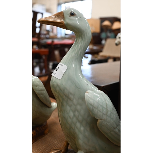 110 - Three Chinese celadon-glazed porcelain ducks, 26 cm max