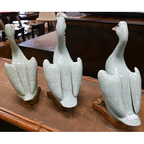 110 - Three Chinese celadon-glazed porcelain ducks, 26 cm max