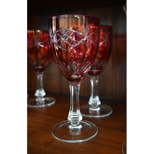 113 - A set of eight cranberry flash cut wine glasses, to/w a heavy quality pair of cut wine glasses and a... 