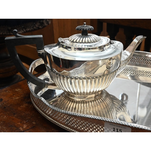 115 - An epns half-fluted tea pot and coffee pot, to/w a galleried oval tray (3)