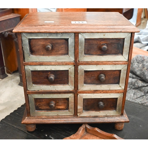 137 - A 19th century oak work-box 33 cm wide to/w a table-top chest of six short drawers, a turned wood co... 