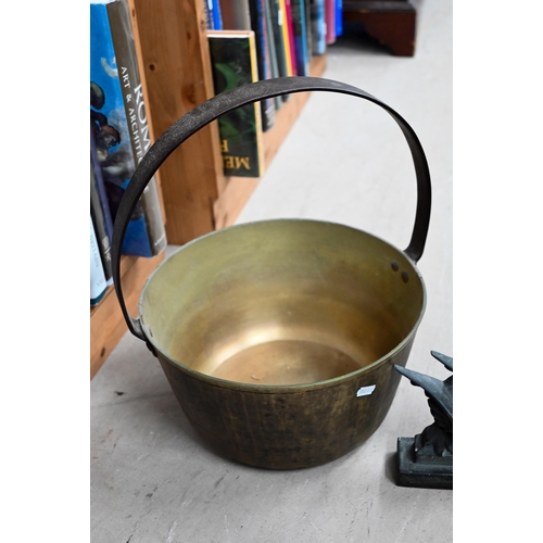 175 - A weighted brass 'dragon' doorstop, to/w a brass preserving pan (2)