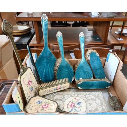 180 - A silver hairbrush, to/w a gilt metal and enamelled brush set and another brush set on tray etc (box... 