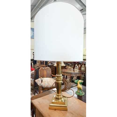 204 - A heavy brass pillar table lamp, 75 cm high