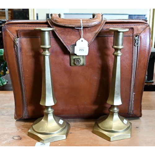 205 - #A pair of brass candlesticks, stamped with registered number, 30 cm high to/w a leather Norris brie... 