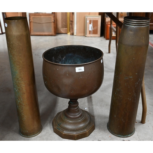 211 - Two large brass artillery shell-cases (suitable for stick-stands), to/w a stemmed copper jardiniere ... 