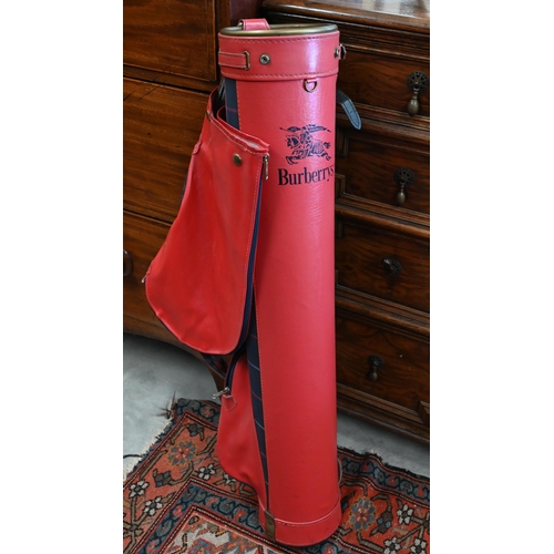 218 - A Burberrys red leather golf bag with cover