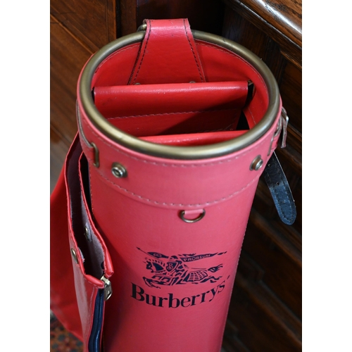 218 - A Burberrys red leather golf bag with cover