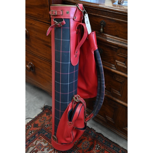 218 - A Burberrys red leather golf bag with cover